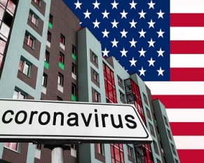 apartment buildings with American flag and coronavirus sign