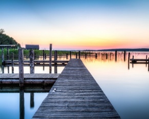 boat docks at sunset