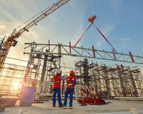 Construction workers truss installation