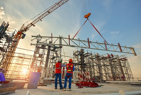 Construction workers truss installation