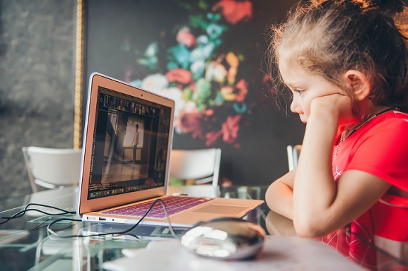 child learning remotely