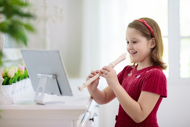child playing recorder