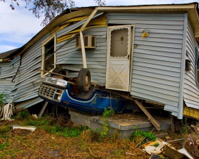 house with structural and foundational damage after a hurricane