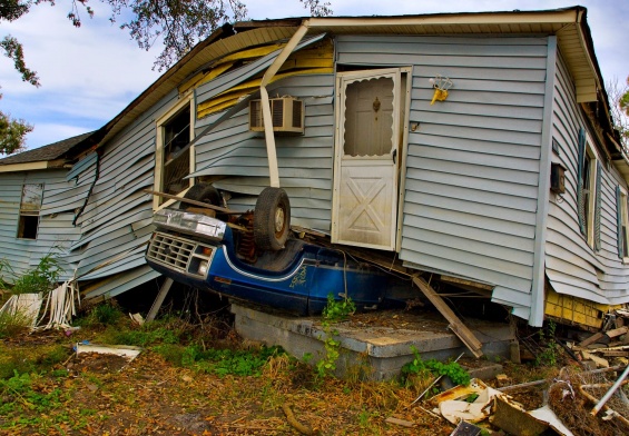 house with structural and foundational damage after a hurricane