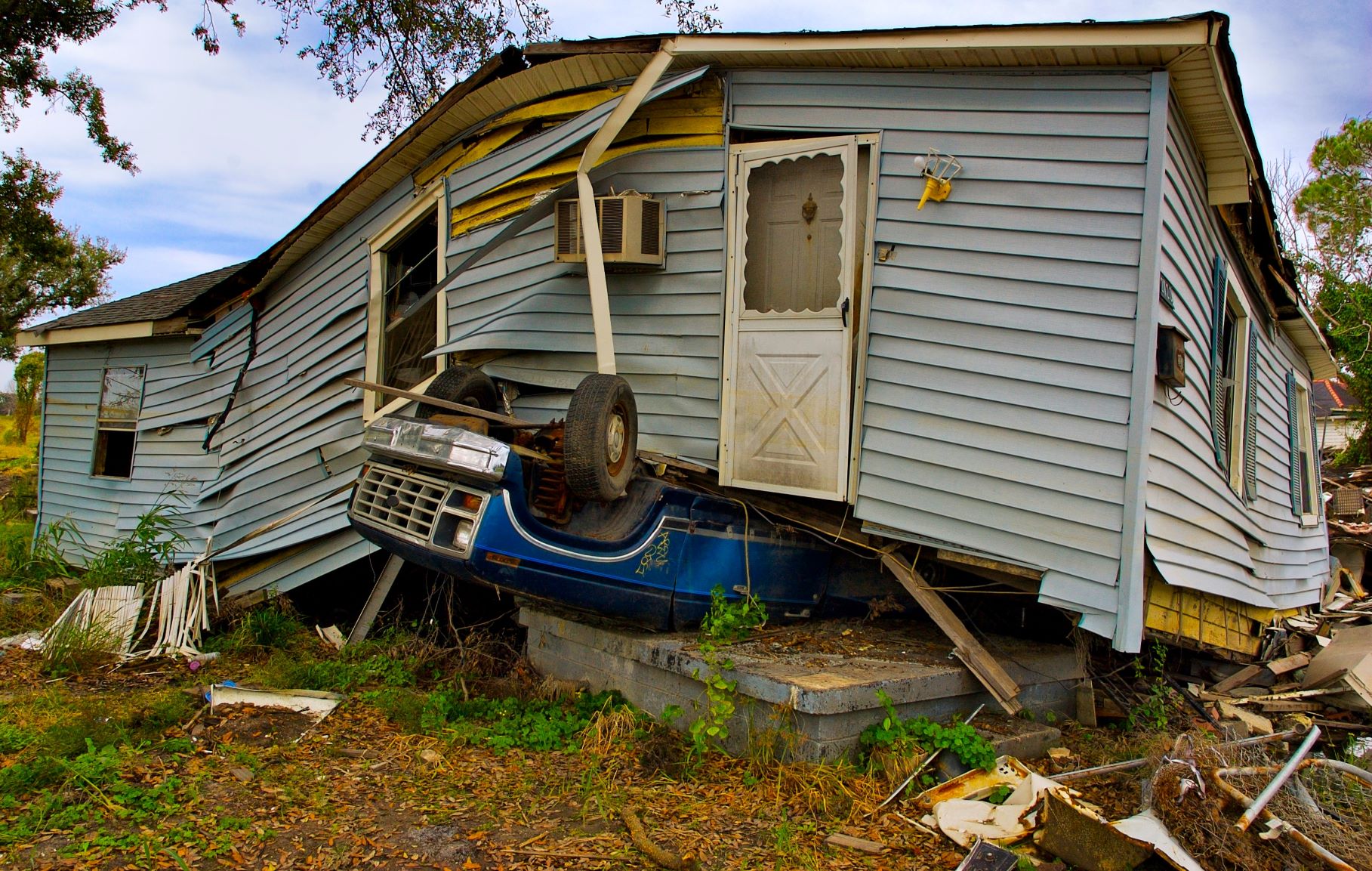 house with structural and foundational damage after a hurricane